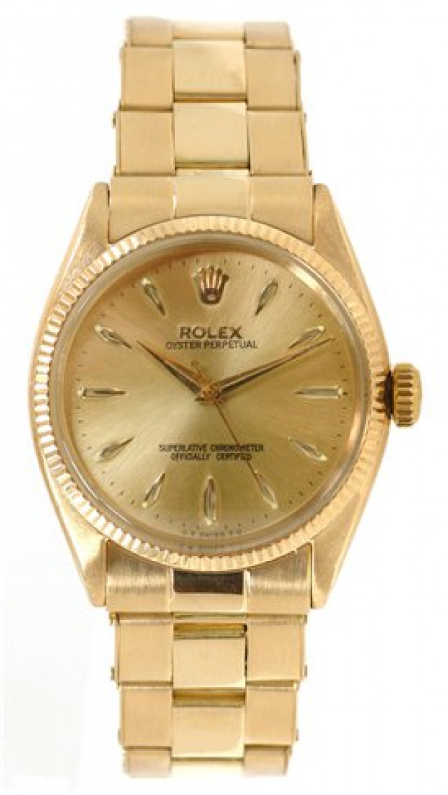 Rolex 6567 Yellow Gold on Oyster, Fluted Bezel Champagne with Gold Index